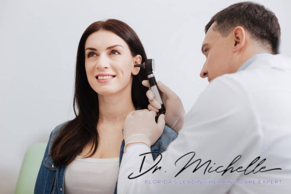 doctor checking a woman's ear